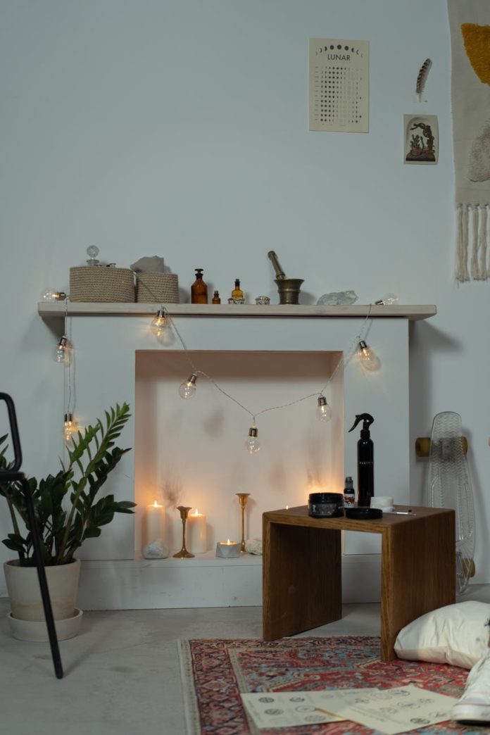 pexels-photo-7190006 white candles on brown wooden table
