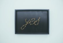 yes signage on brown wooden chalkboard