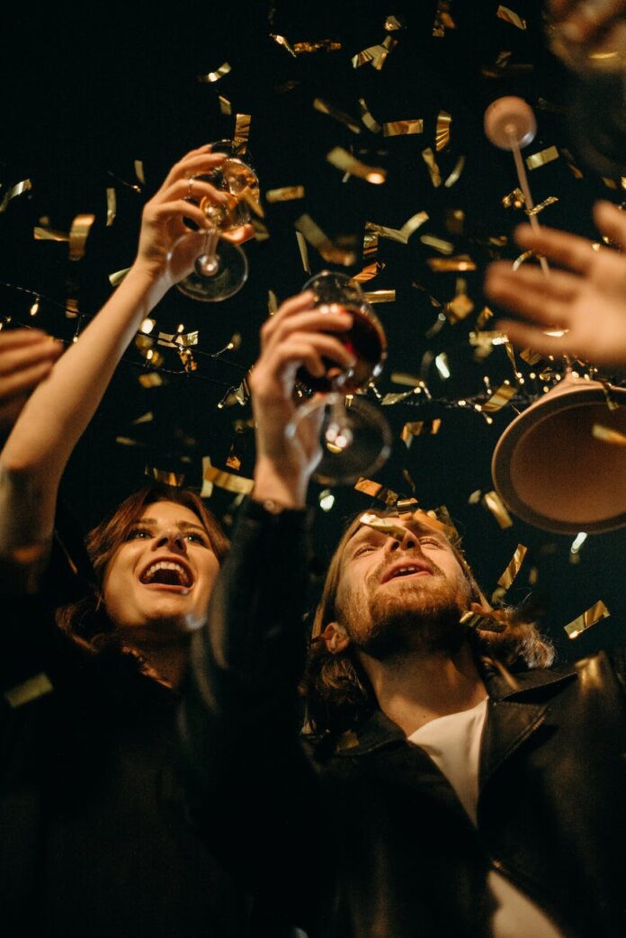 pexels-photo-3171811 people holding wine glasses